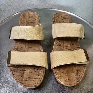 Vionic Pepper is a slide-style platform wedge.